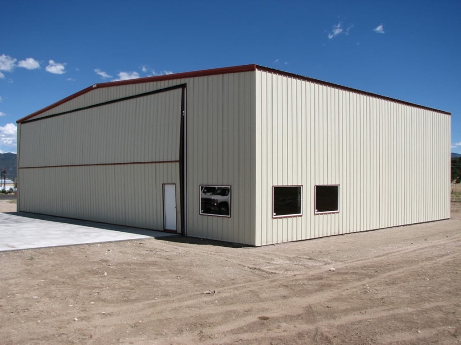 This image shows an airplane hangar built by General Steel.